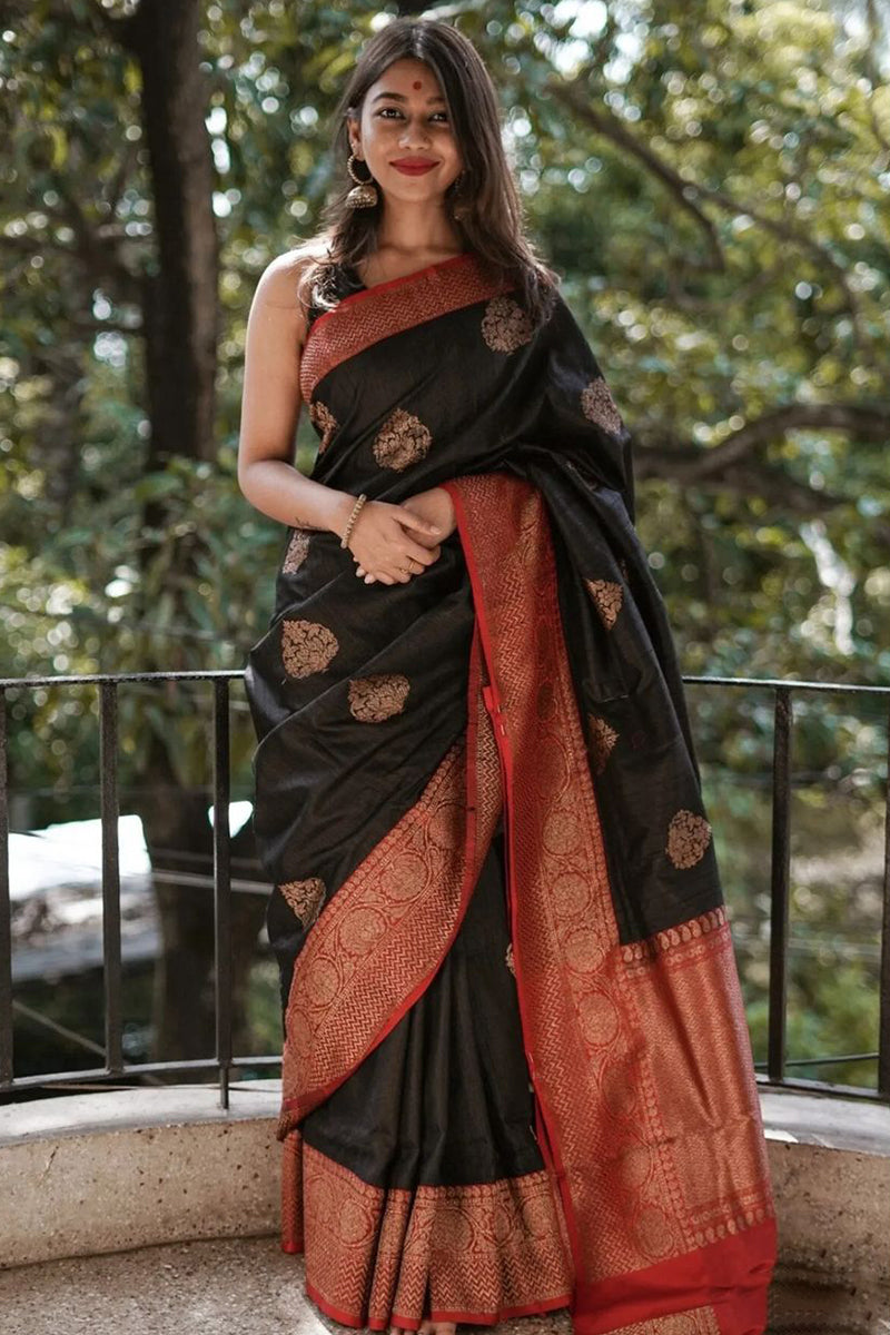 Ecstatic Black Color Soft Lichi Silk Saree With Blouse Piece