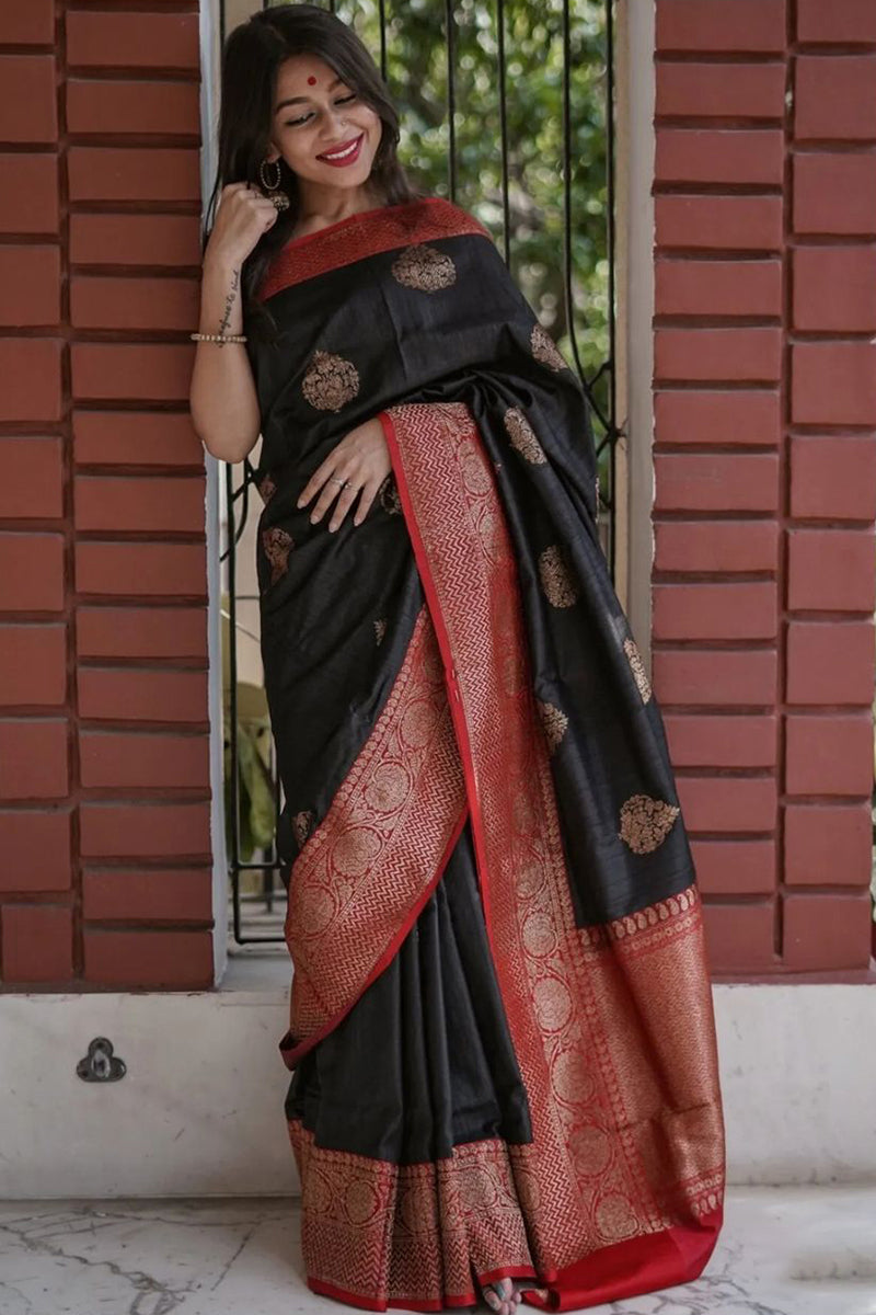 Ecstatic Black Color Soft Lichi Silk Saree With Blouse Piece