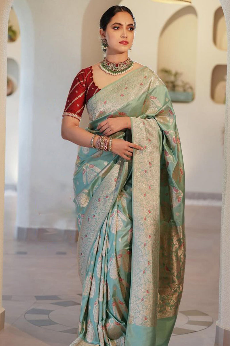 Magnetic Sea Green Soft Silk Saree With Demure Blouse Piece