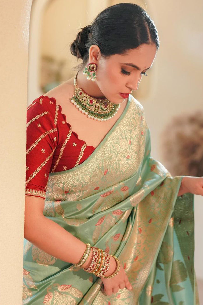 Magnetic Sea Green Soft Silk Saree With Demure Blouse Piece