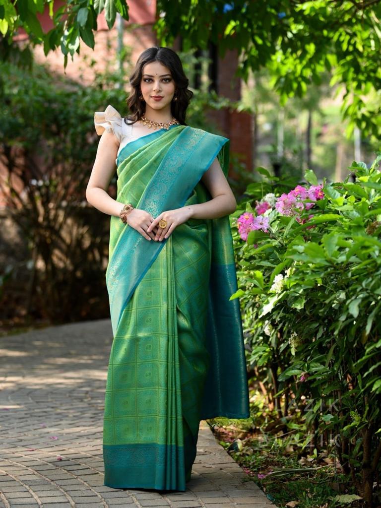 Sultry Sea Green Color Banarasi Soft Silk Saree With Blouse Piece