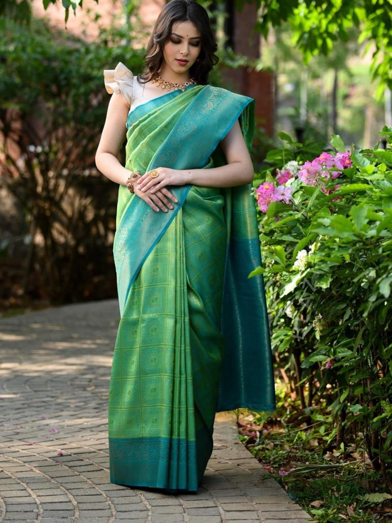 Sultry Sea Green Color Banarasi Soft Silk Saree With Blouse Piece