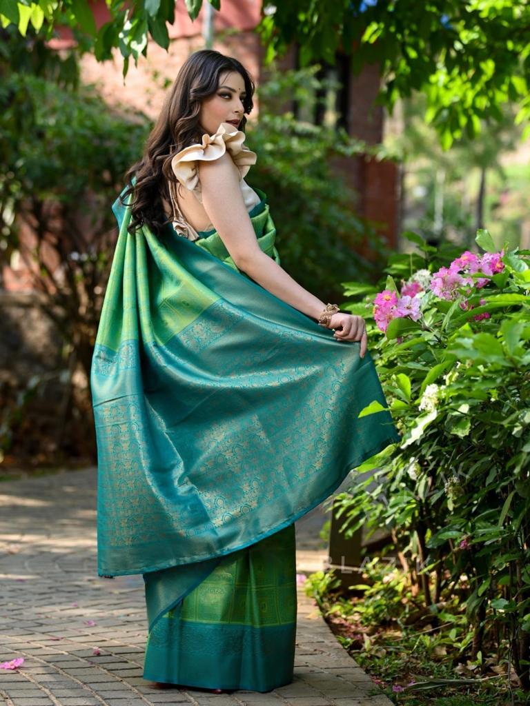 Sultry Sea Green Color Banarasi Soft Silk Saree With Blouse Piece