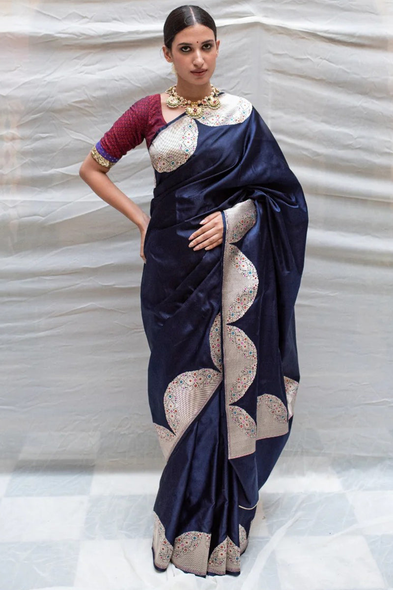 Glossy Navy Blue Color Banarasi Soft Silk Saree With Blouse Piece