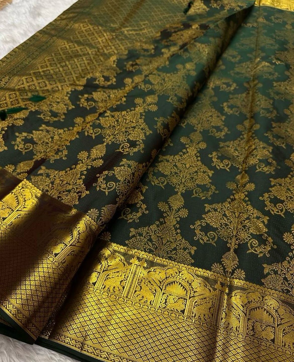 Captivating Dark Green Color Banarasi Soft Silk Saree With Blouse Piece