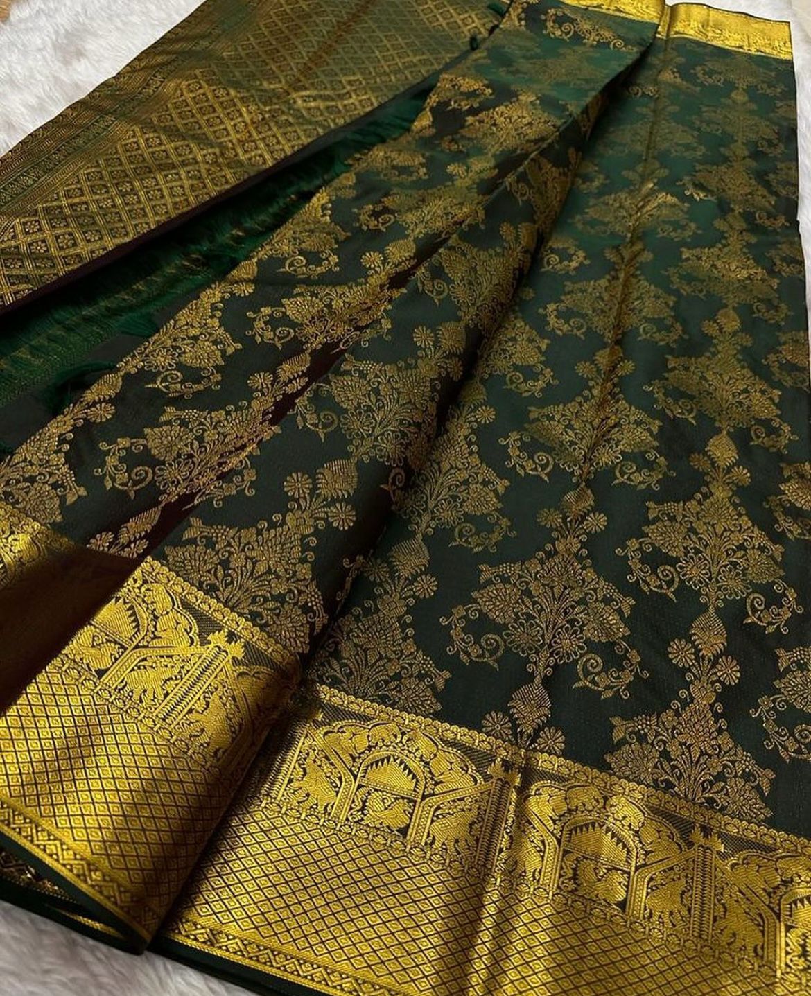 Captivating Dark Green Color Banarasi Soft Silk Saree With Blouse Piece