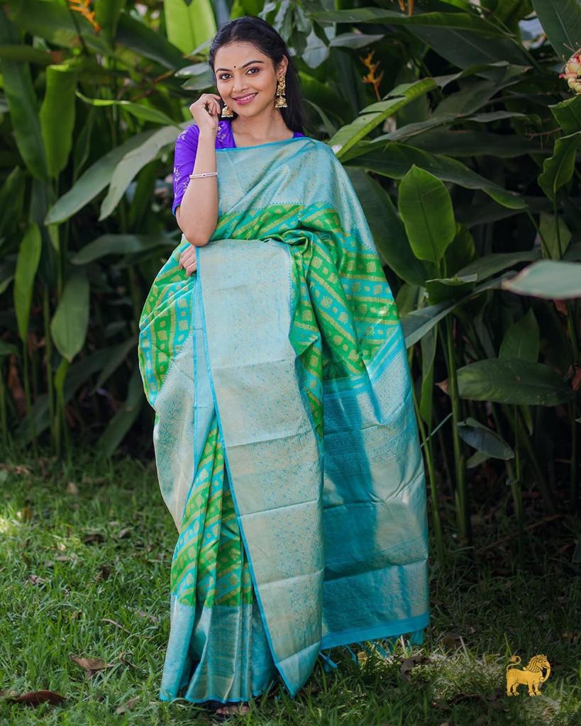 Whimsical Parrot Green Color Soft Lichi Silk Saree With Blouse Piece