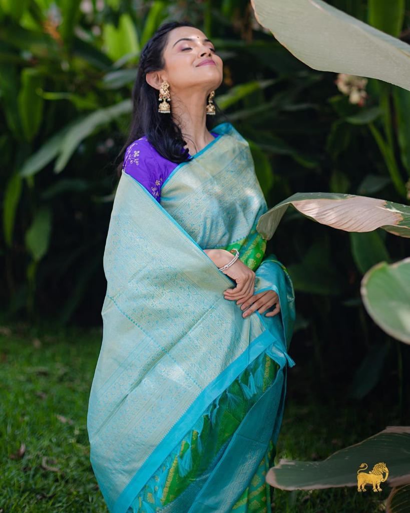 Whimsical Parrot Green Color Soft Lichi Silk Saree With Blouse Piece