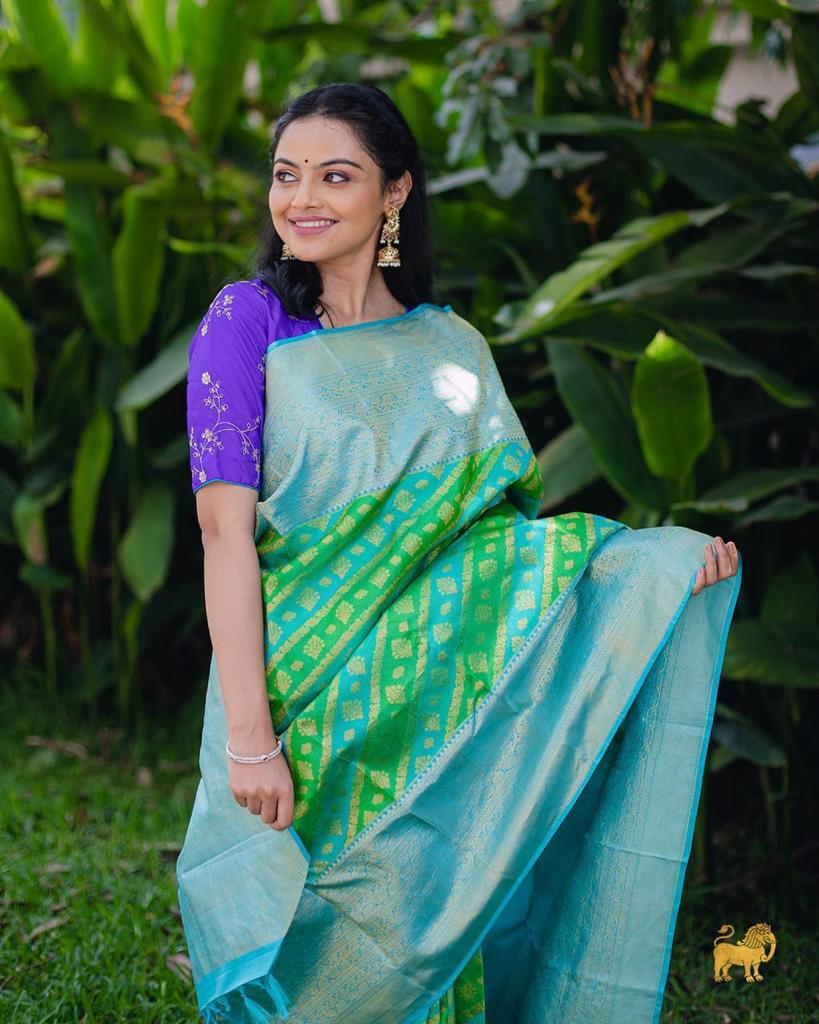 Whimsical Parrot Green Color Soft Lichi Silk Saree With Blouse Piece