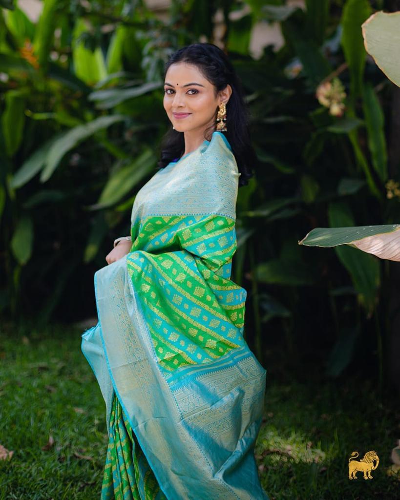 Whimsical Parrot Green Color Soft Lichi Silk Saree With Blouse Piece