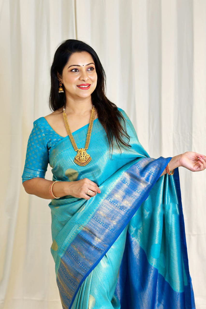 Ethereal Firozi Color Soft Lichi Silk Saree With Blouse Piece