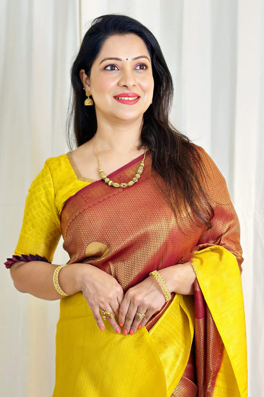 Radiating Yellow Color Soft Lichi Silk Saree With Blouse Piece