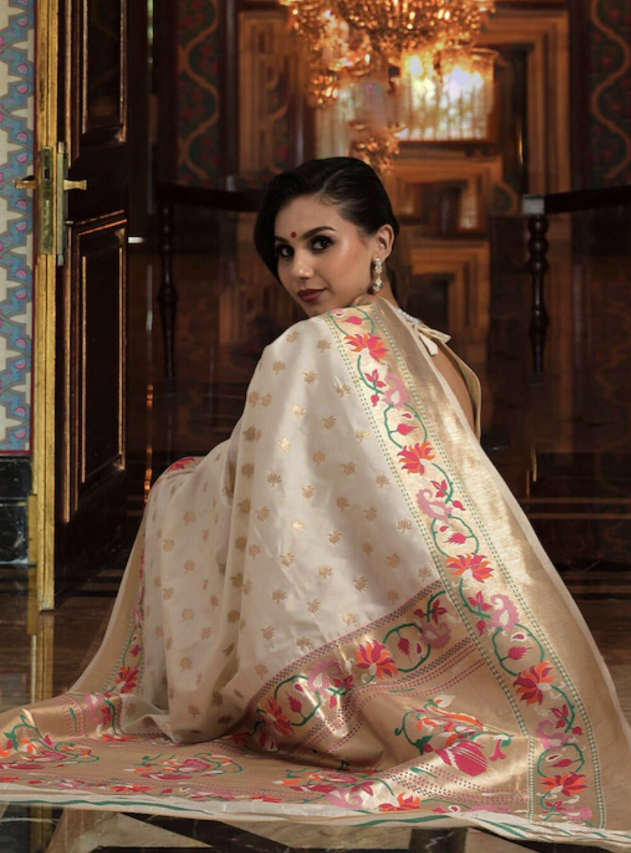 Luminous Off White Color Paithani Silk Saree With Blouse Piece