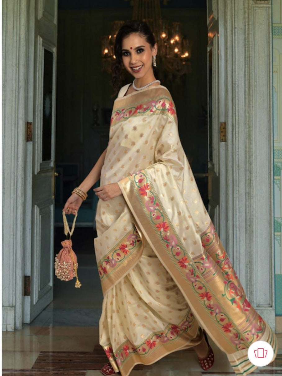 Luminous Off White Color Paithani Silk Saree With Blouse Piece