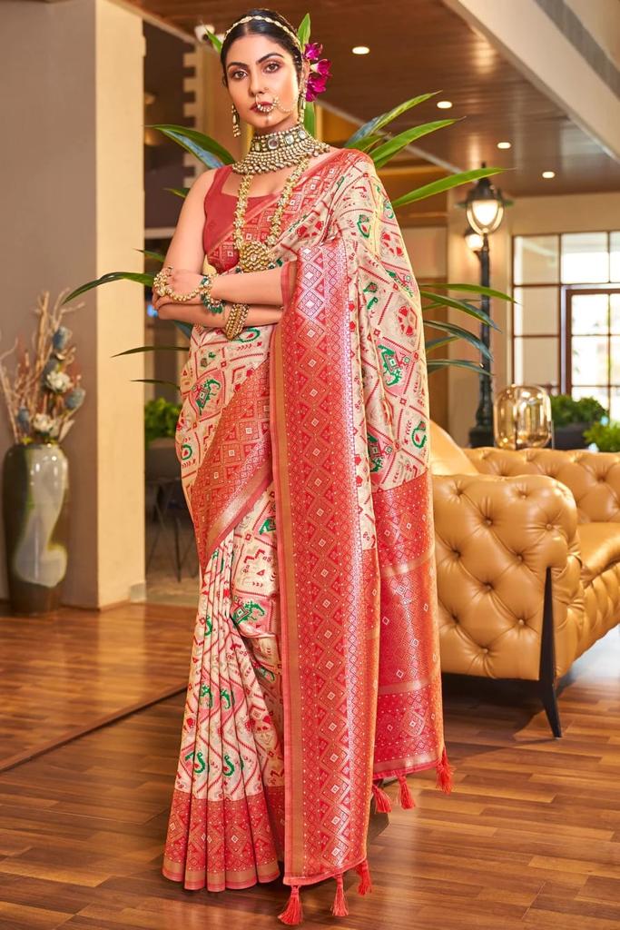 Coruscating Beige Color Patola Silk Saree With Blouse Piece