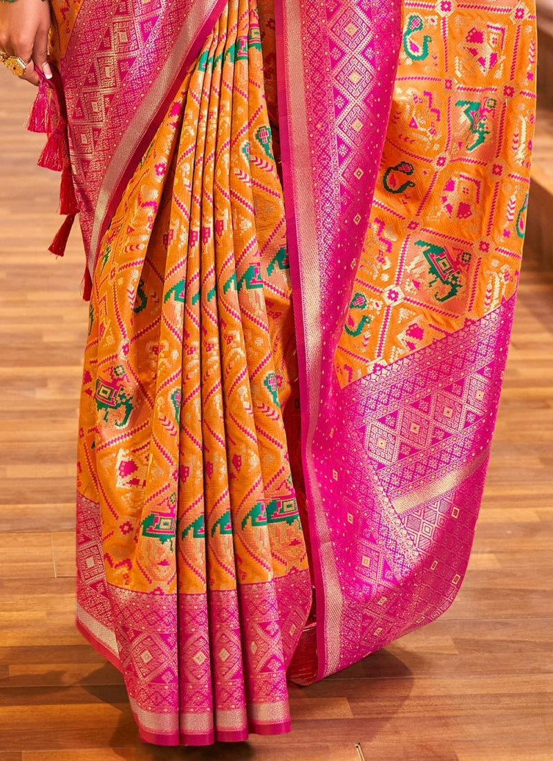 Enchanting Orange Color Patola Silk Saree With Blouse Piece