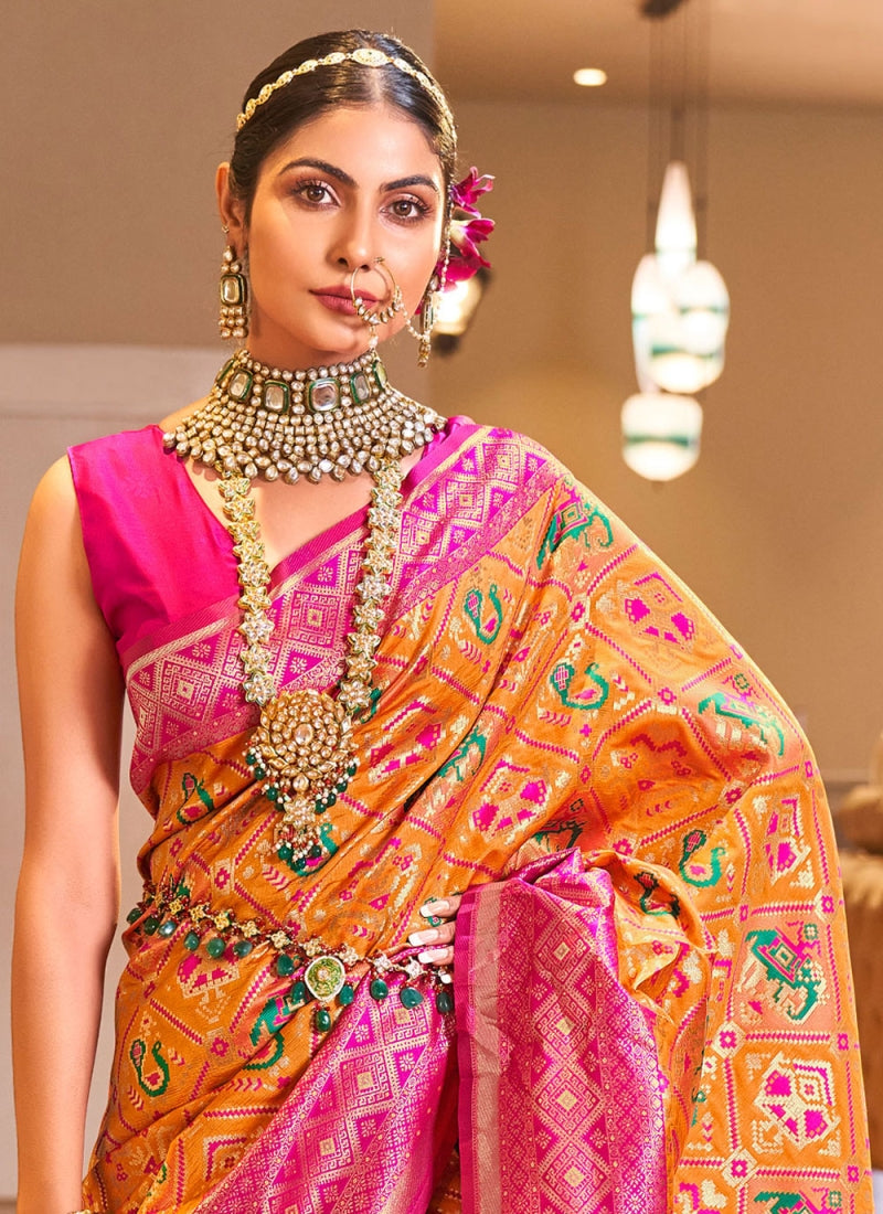 Enchanting Orange Color Patola Silk Saree With Blouse Piece