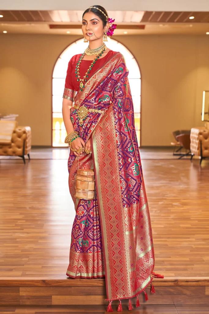 Mystical Purple Color Patola Silk Saree With Blouse Piece