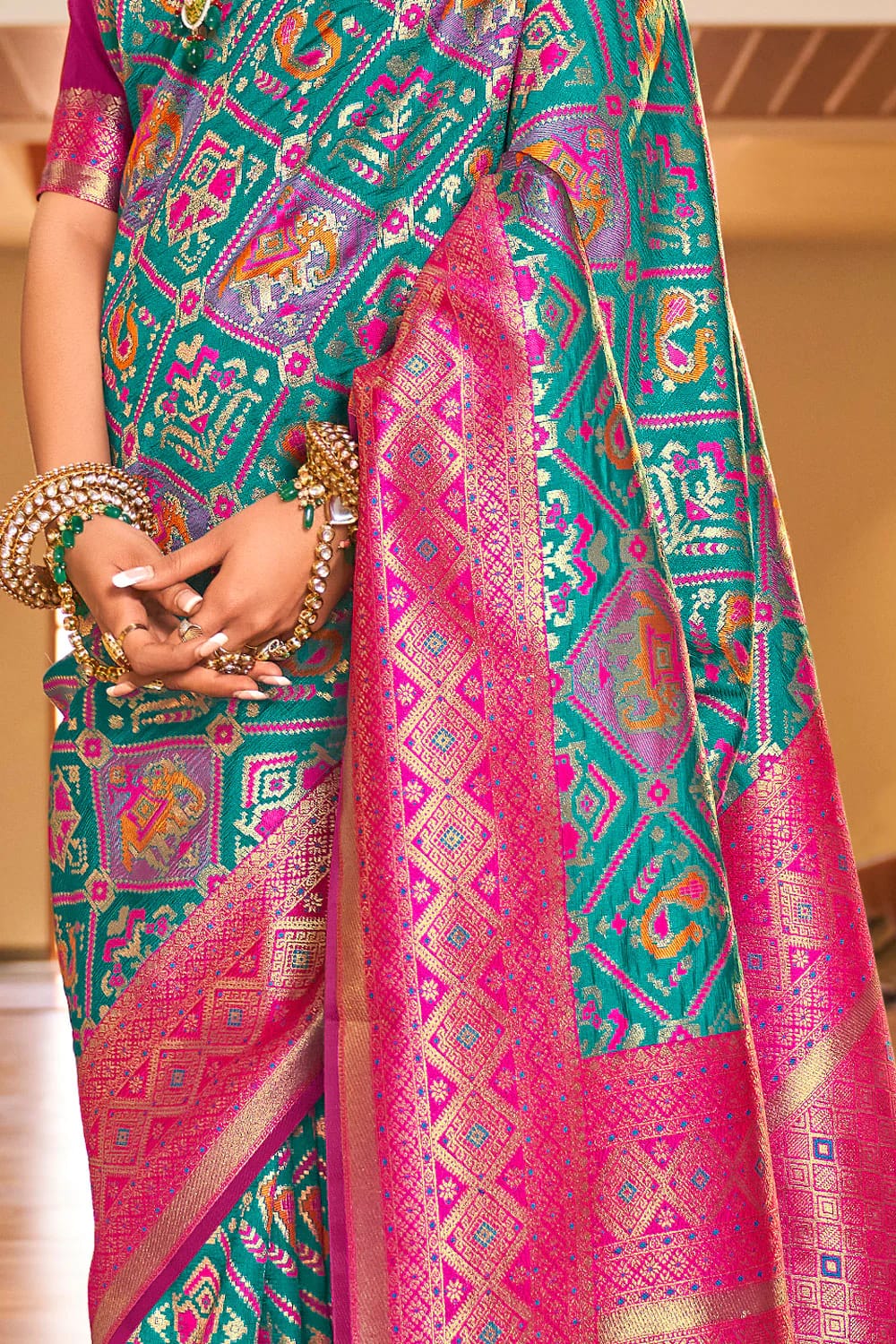 Soothing Turquoise Blue Color Patola Silk Saree With Blouse Piece