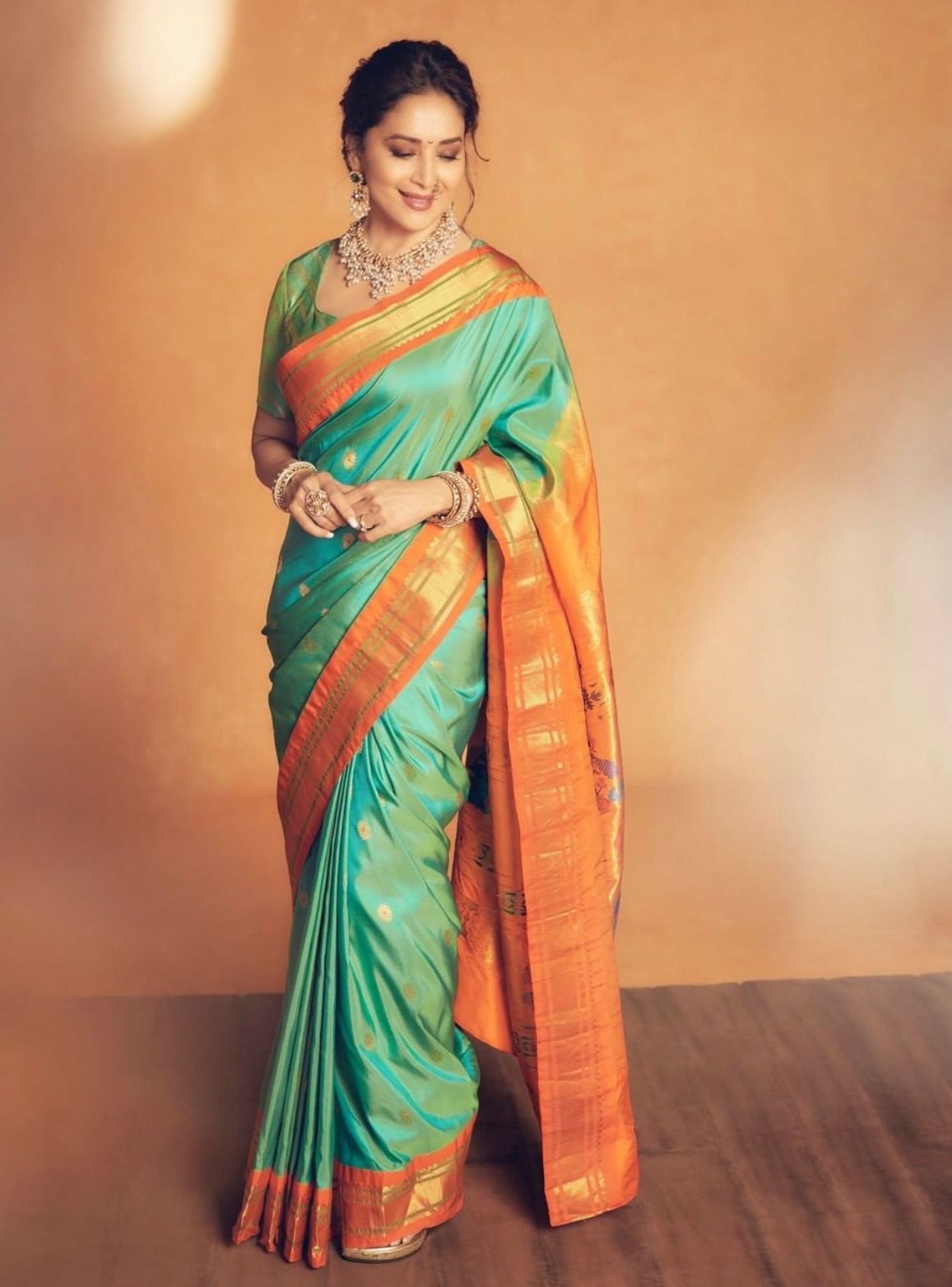 Breathtaking Firozi Color Soft Lichi Silk Saree With Blouse Piece