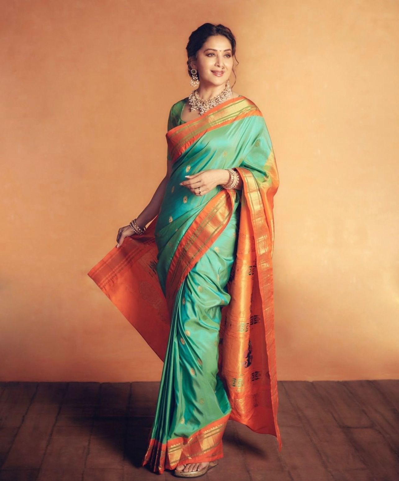 Breathtaking Firozi Color Soft Lichi Silk Saree With Blouse Piece