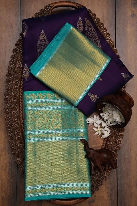 Enchanting Purple Color Soft Lichi Silk Saree With Blouse Piece