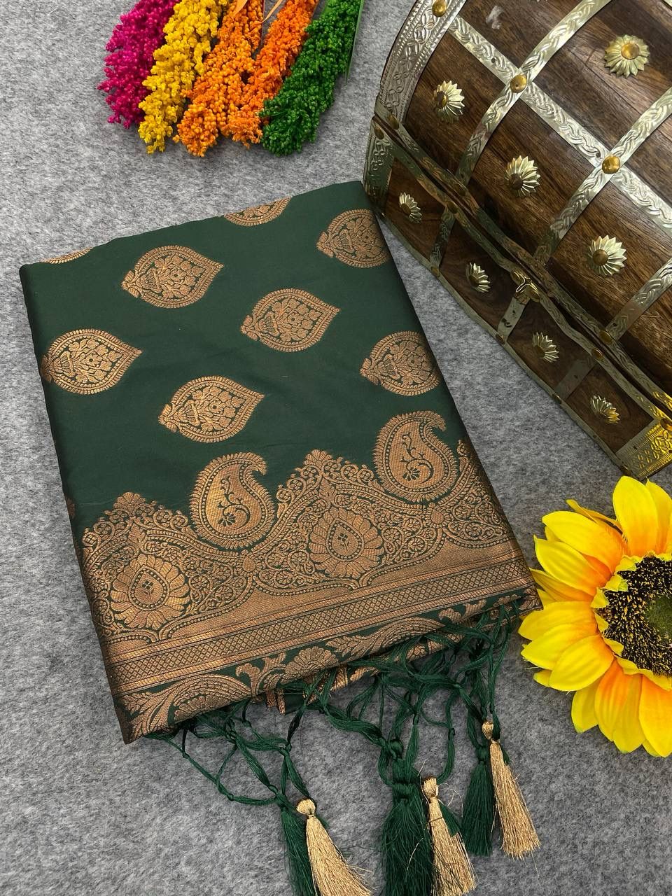 Glamorous Dark Green Color Banarasi Soft Silk Saree With Blouse Piece