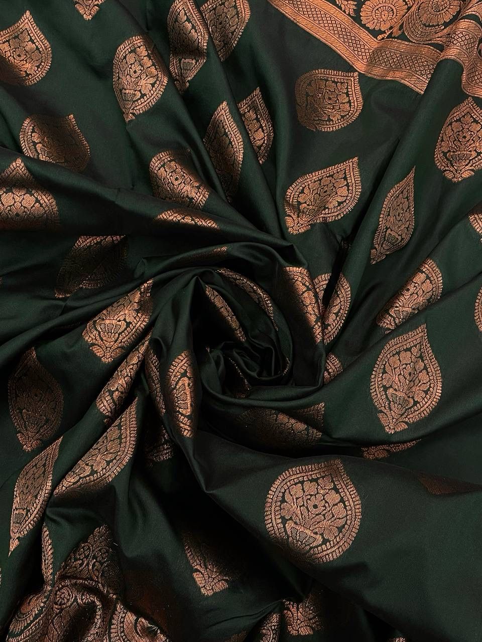 Glamorous Dark Green Color Banarasi Soft Silk Saree With Blouse Piece