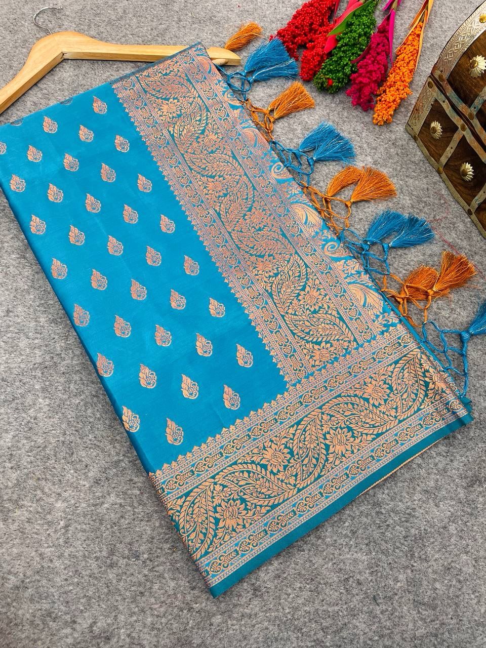 Glamorous Firozi Color Banarasi Soft Silk Saree With Blouse Piece