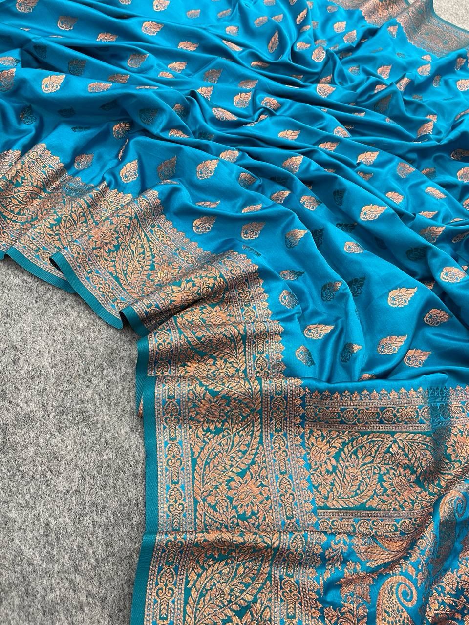 Glamorous Firozi Color Banarasi Soft Silk Saree With Blouse Piece