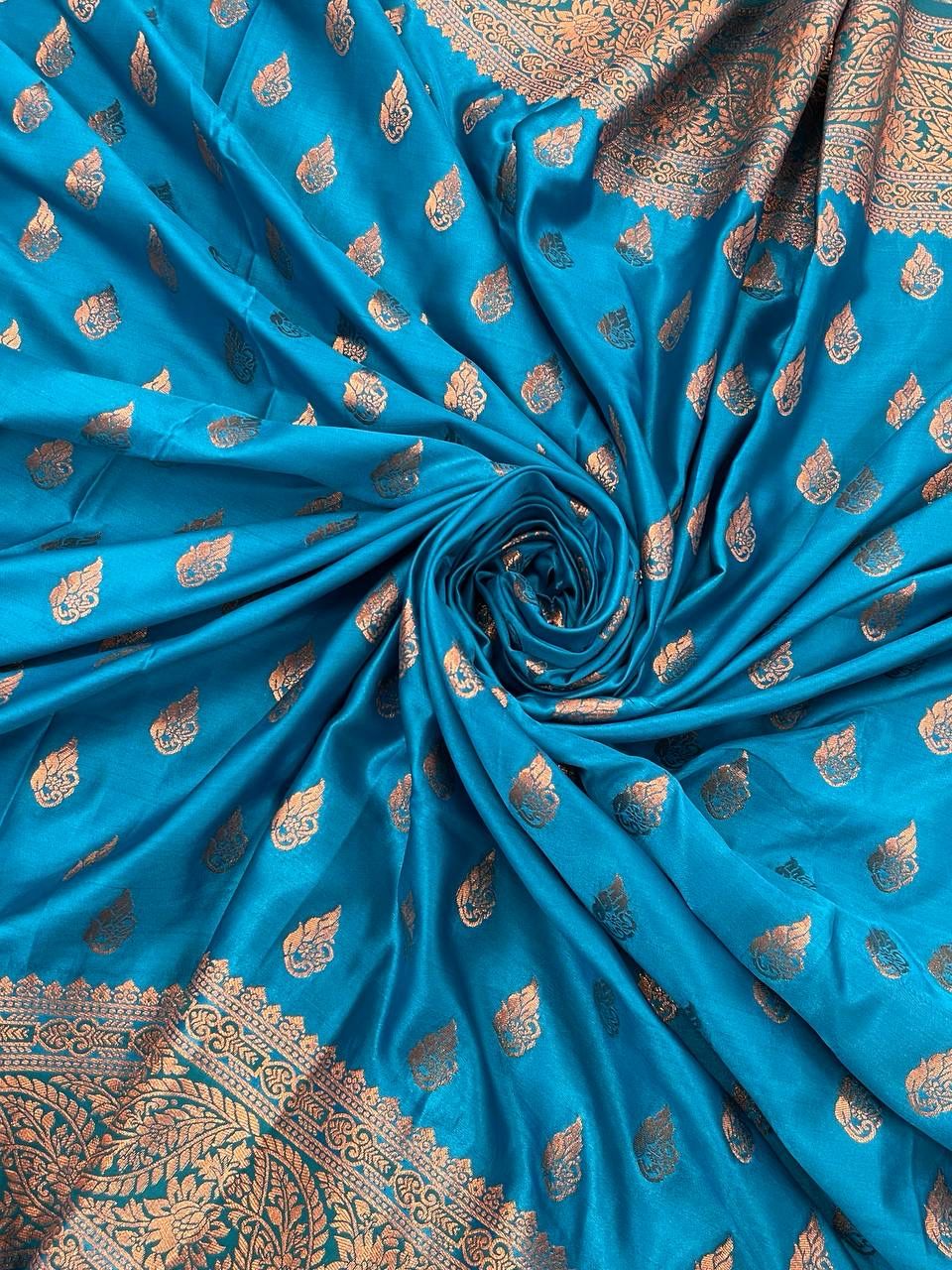 Glamorous Firozi Color Banarasi Soft Silk Saree With Blouse Piece