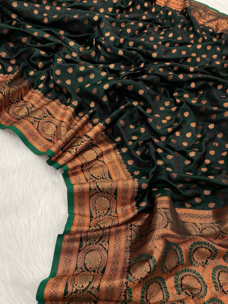 Splendid Dark Green Color Banarasi Soft Silk Saree With Blouse Piece