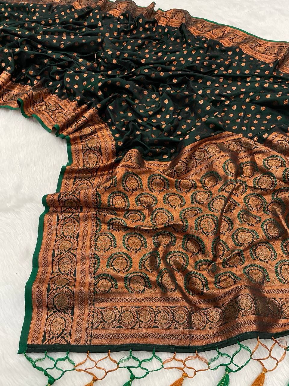 Splendid Dark Green Color Banarasi Soft Silk Saree With Blouse Piece