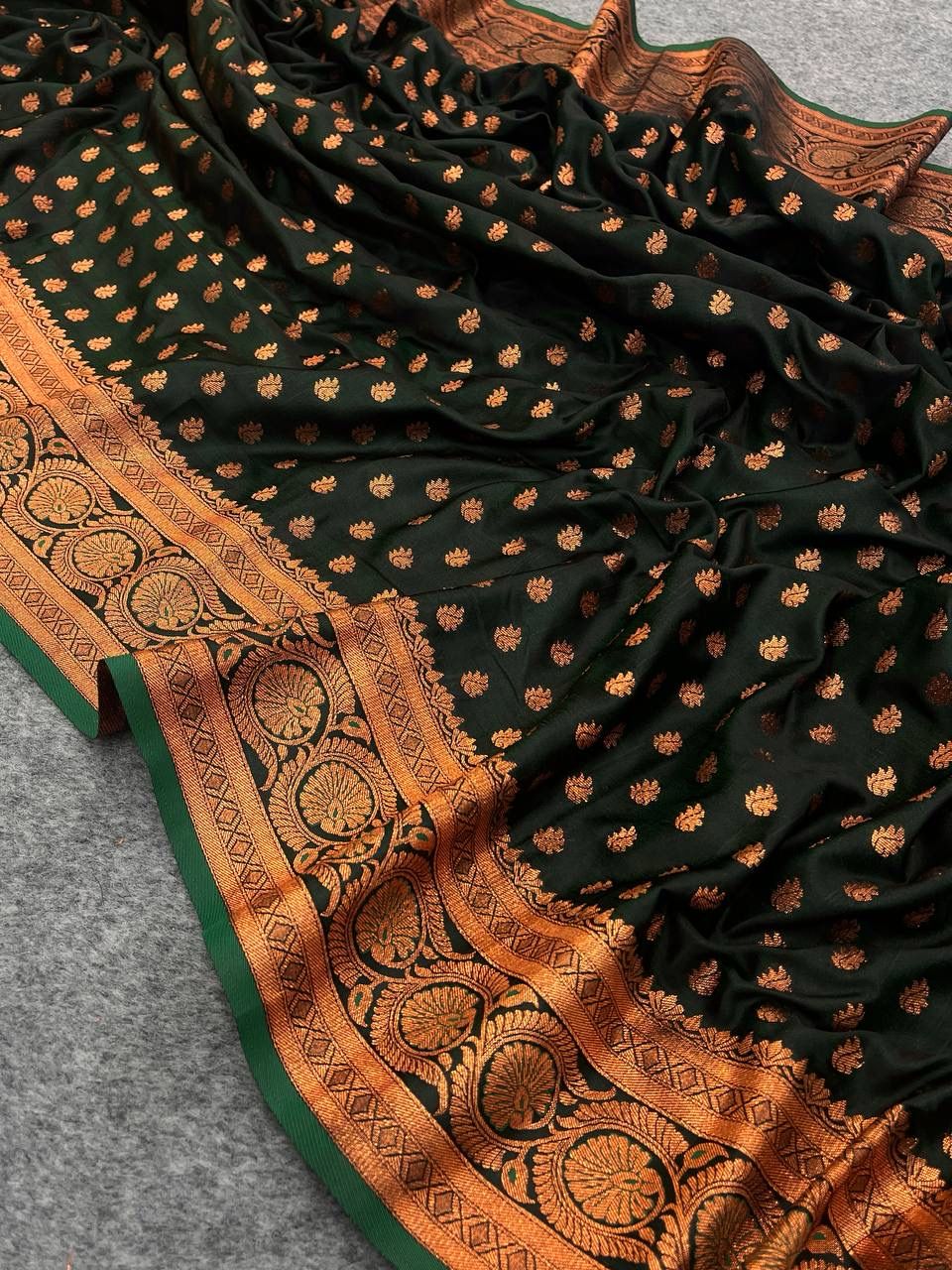 Splendid Dark Green Color Banarasi Soft Silk Saree With Blouse Piece