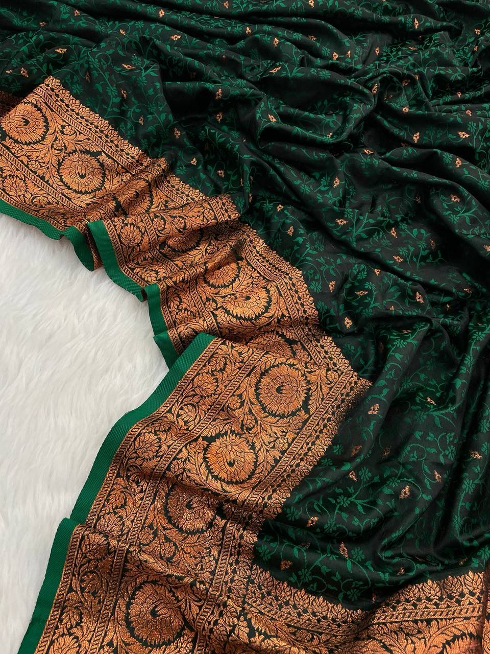 Breathtaking Dark Green Color Banarasi Soft Silk Saree With Blouse Piece