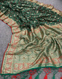 Opulent Dark Green Color Banarasi Soft Silk Saree With Blouse Piece