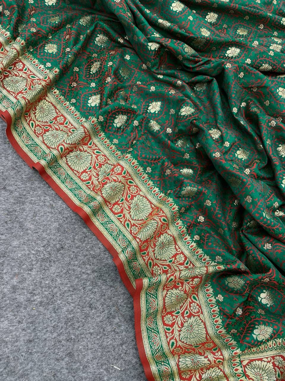 Opulent Dark Green Color Banarasi Soft Silk Saree With Blouse Piece