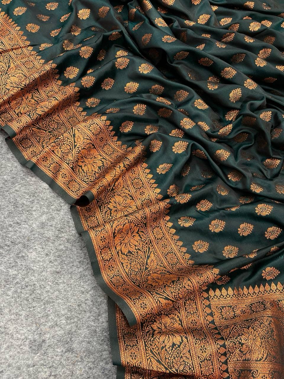 Graceful Dark Green Color Banarasi Soft Silk Saree With Blouse Piece