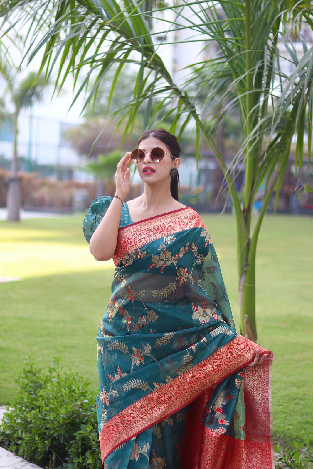 Sublime Rama Green Color Organza Silk Saree With Blouse Piece