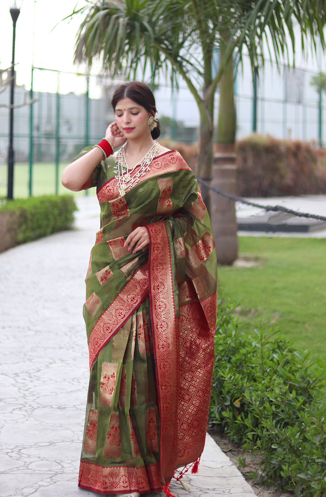 Angelic Green Color Organza Silk Saree With Blouse Piece