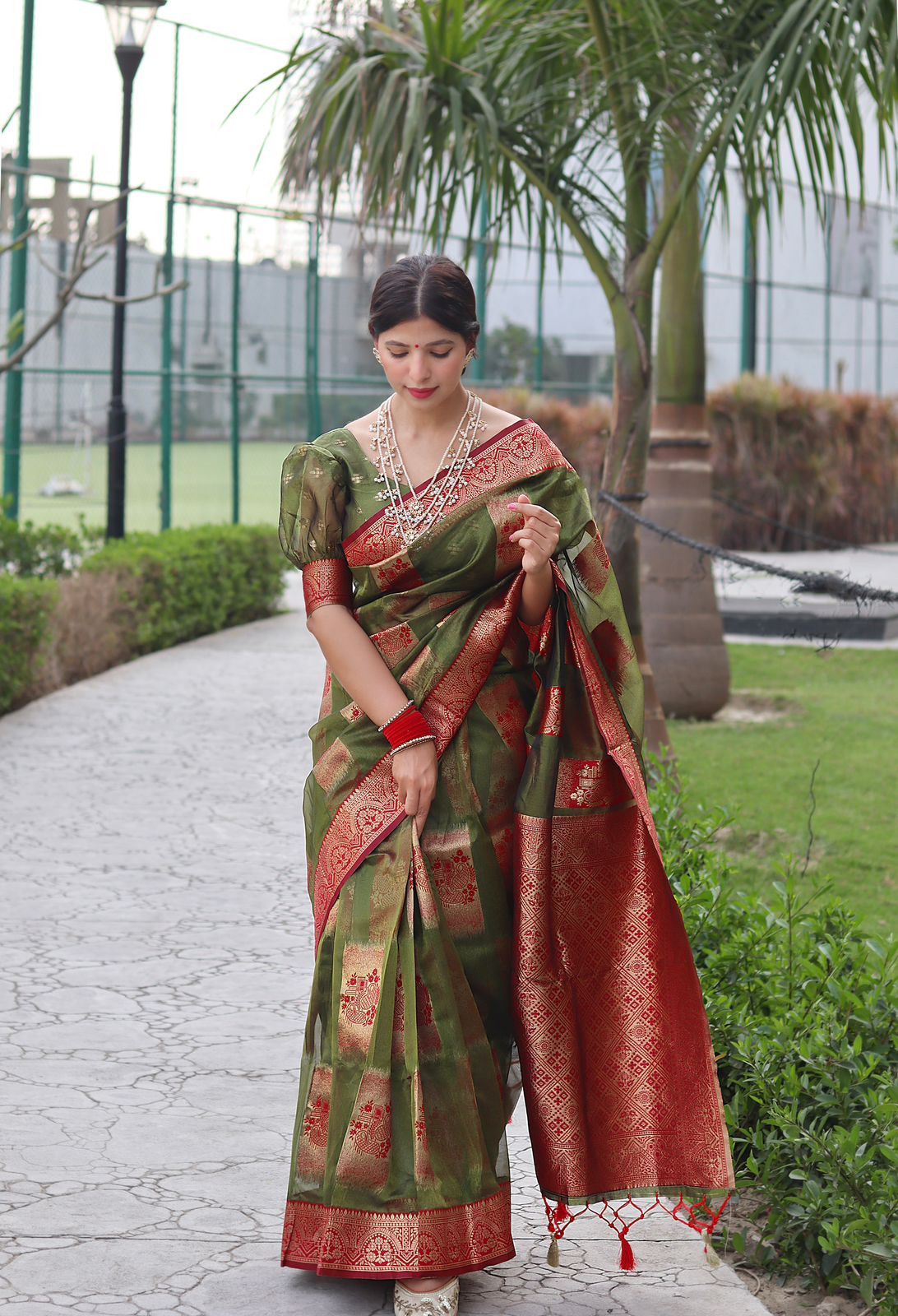 Angelic Green Color Organza Silk Saree With Blouse Piece