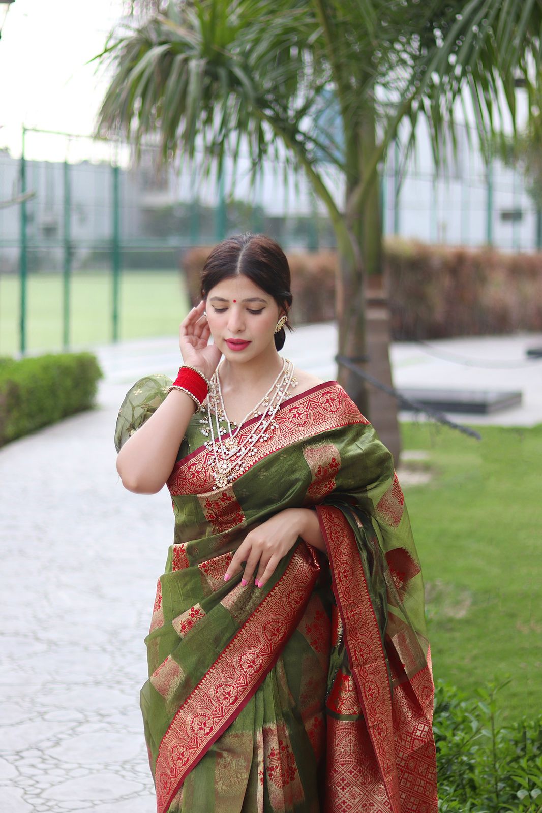 Angelic Green Color Organza Silk Saree With Blouse Piece