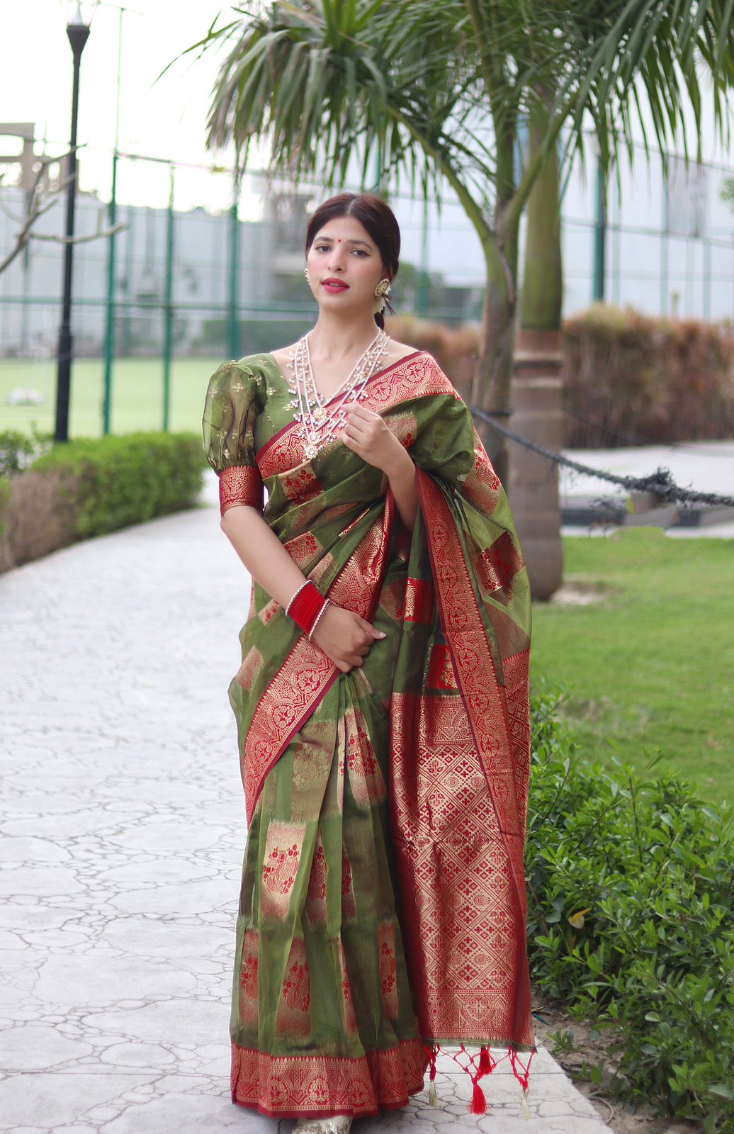 Angelic Green Color Organza Silk Saree With Blouse Piece