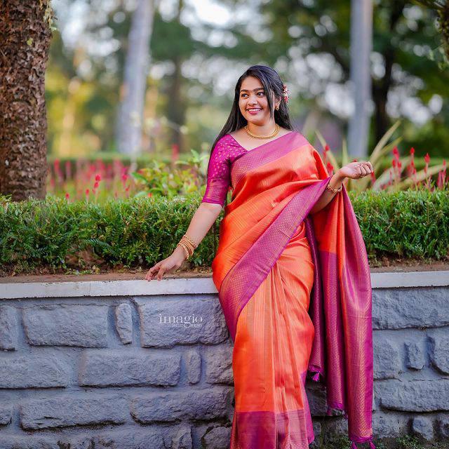 Enchanting Orange Color Kanjivaram Silk Saree With Blouse Piece