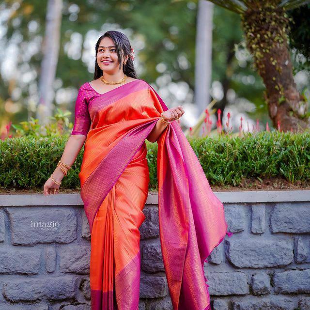 Enchanting Orange Color Kanjivaram Silk Saree With Blouse Piece