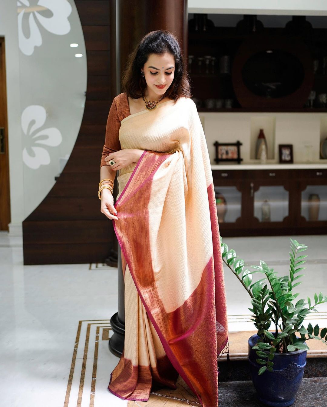 Incandescent Beige Color Banarasi Soft Silk Saree With Blouse Piece