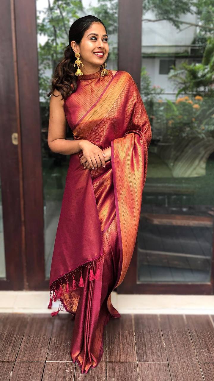 Splendid Wine Color Banarasi Soft Silk Saree With Blouse Piece