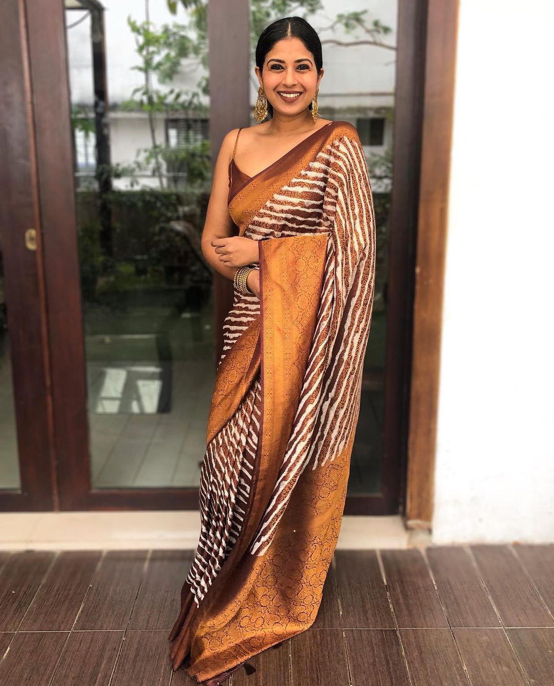 Delicate Brown Color Banarasi Soft Silk Saree With Blouse Piece