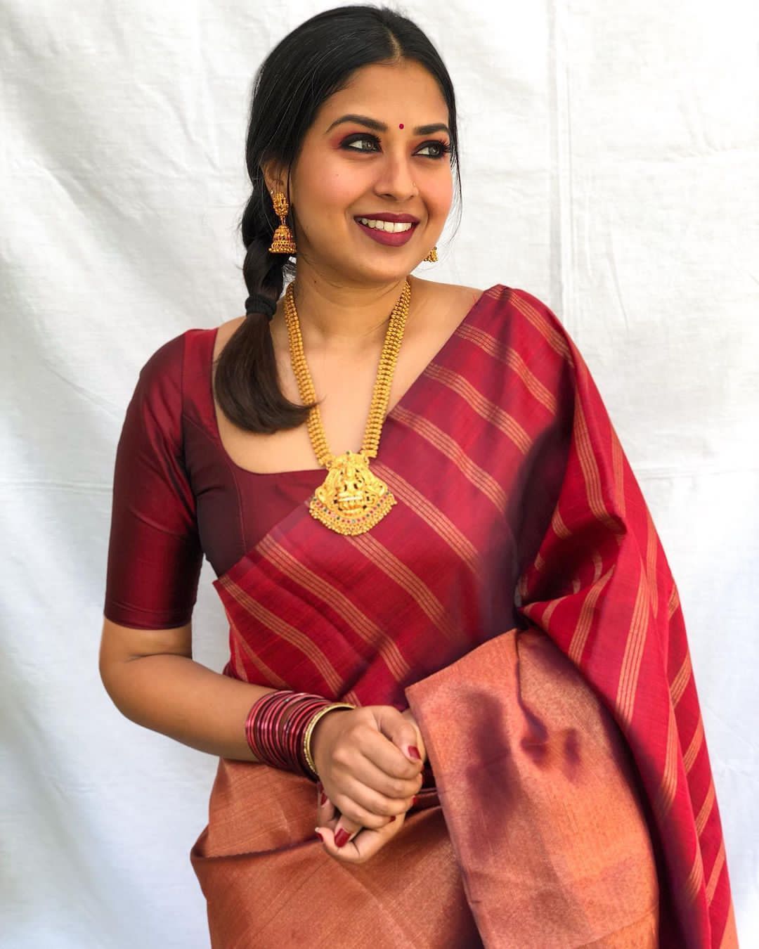 Divine Maroon Color Banarasi Soft Silk Saree With Blouse Piece