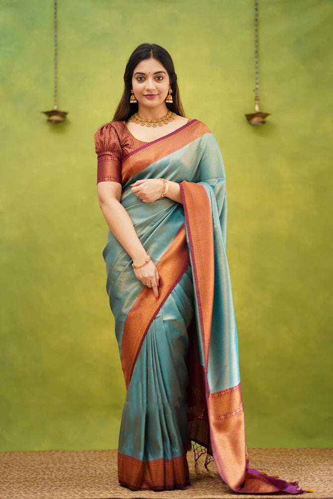 Enigmatic Firozi Color Banarasi Soft Silk Saree With Blouse Piece